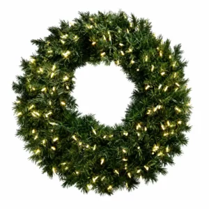 Green Christmas wreath illuminated with warm white lights