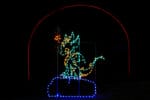 6.5' Animated Baby Dragon With Fire Rings Holiday Light Display