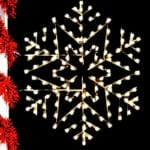 6-foot Arctic Snowflake pole mount Christmas decoration illuminated on a pole