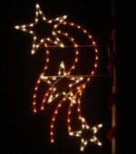 8-foot Falling Stars pole mount holiday light display illuminated on a pole at night