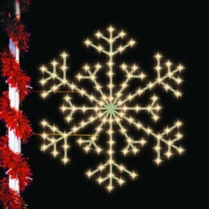 Presidential Snowflake pole mount Christmas light display illuminated at night