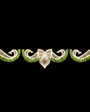 Festive illuminated garland with bow on black background
