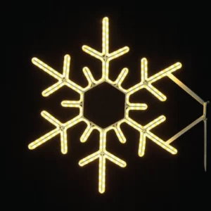 Glowing LED snowflake decoration against black background