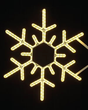 Glowing LED snowflake decoration against black background