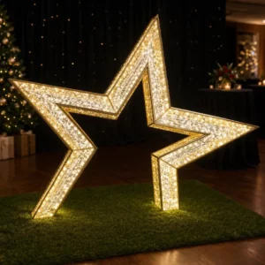 Illuminated gold star decoration at holiday event