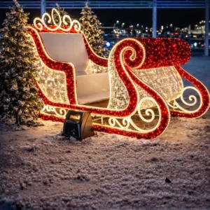 Illuminated Christmas sleigh decoration in snowy night setting