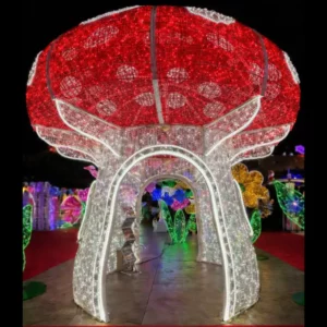 Giant illuminated mushroom light sculpture at night