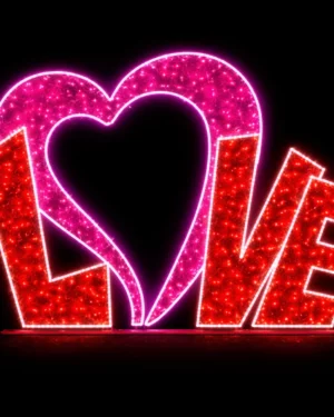 Glittering neon LOVE sign with heart shape