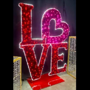 Illuminated LOVE sign with heart-shaped design