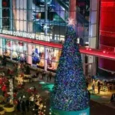 Large decorated Christmas tree inside shopping center atrium