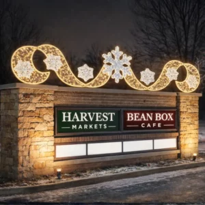 Illuminated Harvest Markets and Bean Box Cafe sign