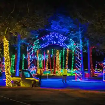 Commercial Christmas lights display with North Pole sign