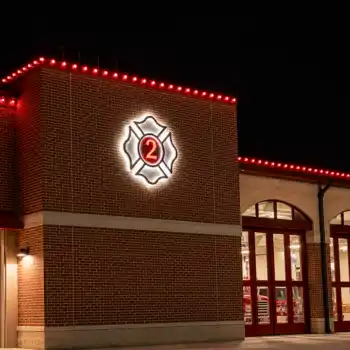 Fire station building at night with commercial RGB lighting