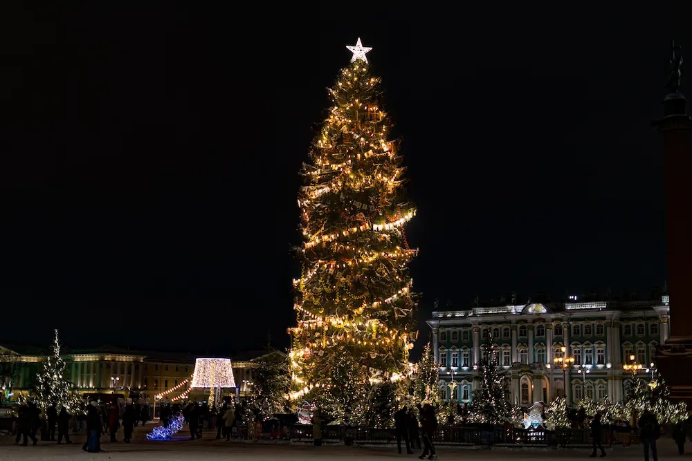 Large commercial Christmas tree on display in a venue atrium