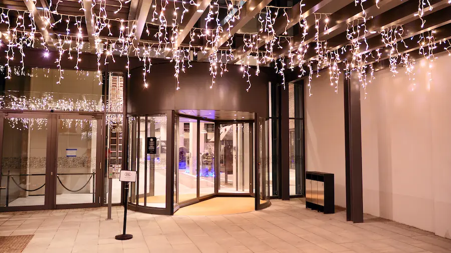 Commercial building with permanent architectural lighting at night