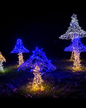 Glowing mushroom-shaped commercial Halloween display at night