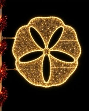 Illuminated sand dollar holiday light decoration at night