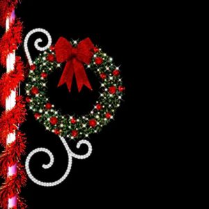 Sparkling Christmas wreath with red bow and ornaments street Christmas decor