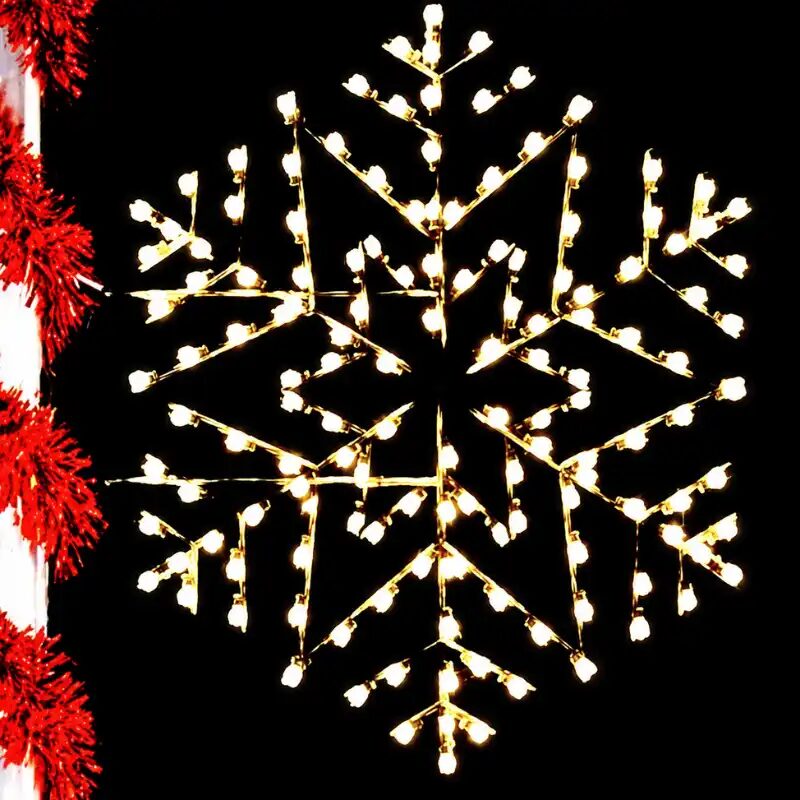Illuminated snowflake decoration with warm white lights