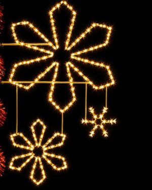 Glowing snowflake holiday lights against dark background