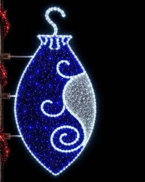 Illuminated blue Christmas ornament street decoration at night