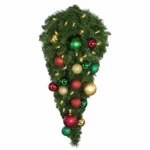 Commercial Christmas spray decoration with colorful ornaments and warm lights