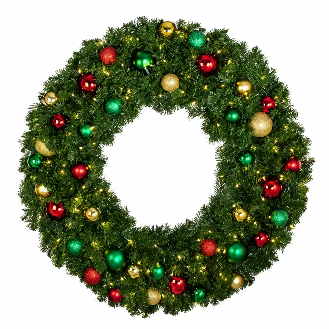 Christmas wreath with colorful ornaments and warm lights