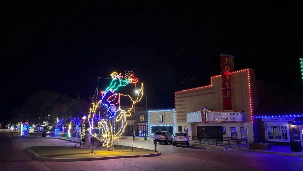 Holiday light display outside historic Tower Theater at night